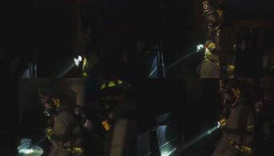 消防员在大楼里用手电筒高清在线视频素材下载