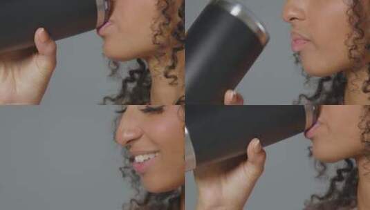 女性用杯子喝水的特写镜头高清在线视频素材下载