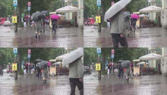 雨天街上撑伞的行人高清在线视频素材下载