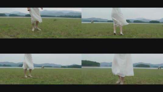 白色连衣裙女子在草原上跳舞舞步特写高清在线视频素材下载