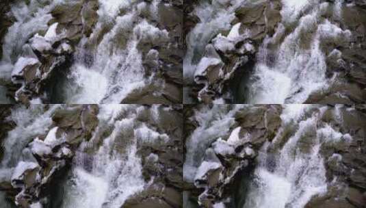 水从山上的岩石中流过高清在线视频素材下载