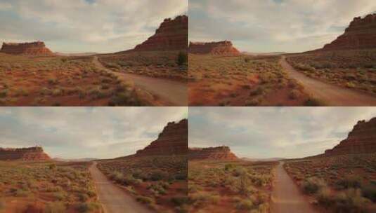 无人机飞越沙漠道路高清在线视频素材下载