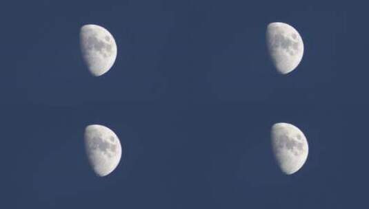 蓝色夜空中的半个月亮高清在线视频素材下载
