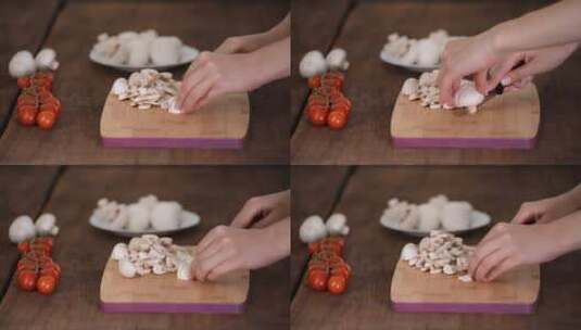 女人在木菜板上切蘑菇高清在线视频素材下载