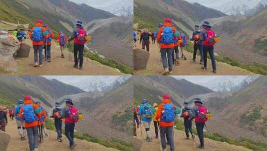 四川甘孜攀登那玛峰的登山者徒步进山高清在线视频素材下载