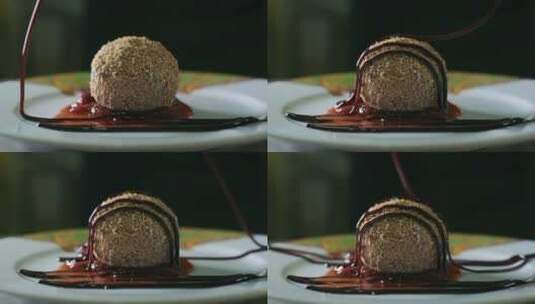 厨师往巧克力球上淋焦糖高清在线视频素材下载