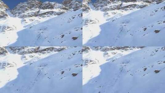 蒂罗尔阿尔卑斯山倾斜景观中雪山壁，雪崩小径高清在线视频素材下载