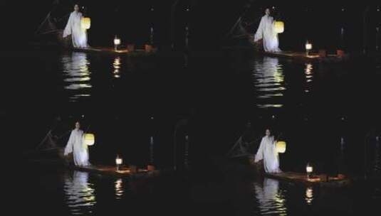 古装人物在漓江上挑起灯火高清在线视频素材下载