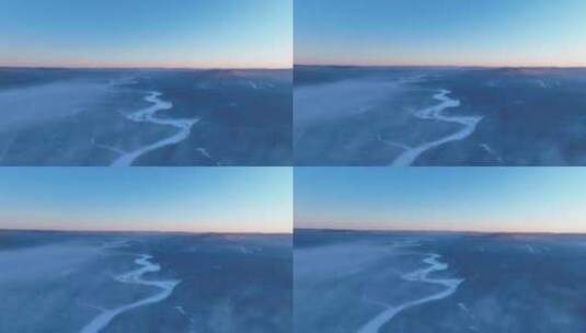 航拍寒冬林海雪原冻雾冰河高清在线视频素材下载