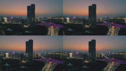 航拍杭州西兴大桥与机场高架立交桥蓝调风光高清在线视频素材下载