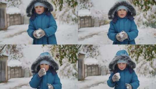 在一个多雪的城市，一个强壮的孩子与暴雪娱高清在线视频素材下载