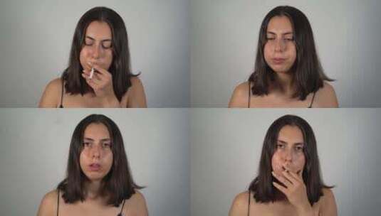 悲伤的年轻女人吸烟4K高清在线视频素材下载