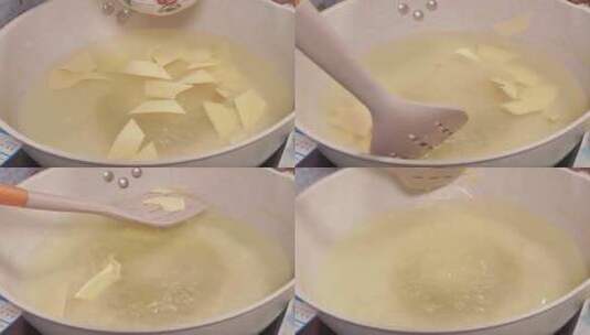 开水汆汤煮豆皮千张豆制品高清在线视频素材下载