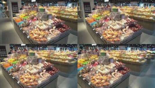 超市内部场景，零食、水果、牛奶货架商品高清在线视频素材下载