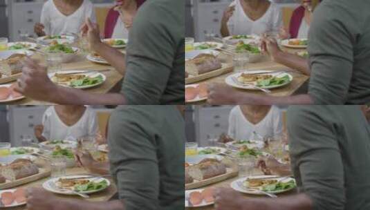 一家人围着一桌子美食高清在线视频素材下载