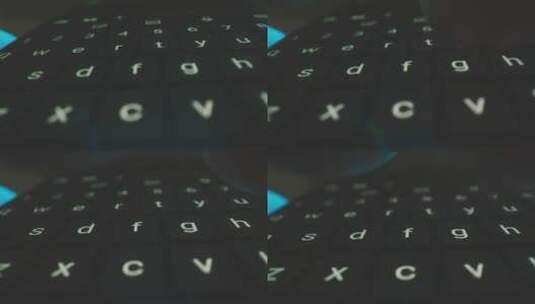 敲击笔记本电脑键盘的特写镜头高清在线视频素材下载