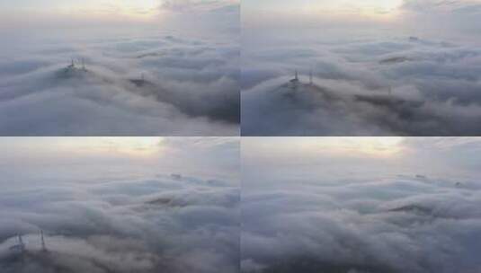 云海云端云层之上城市航拍摩天大楼高清在线视频素材下载