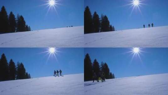 穿着雪地靴走在阳光照射下的雪山上镜头特写高清在线视频素材下载