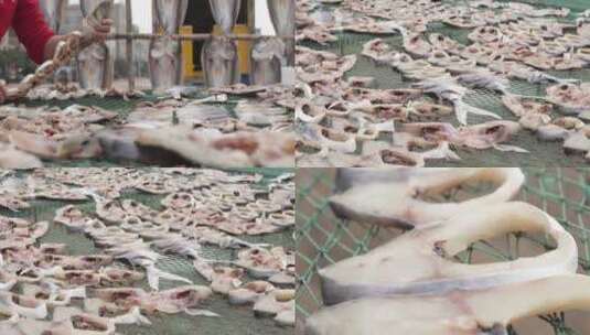 4k.l1广东省雷州市将鱼晾晒在架子上特写高清在线视频素材下载