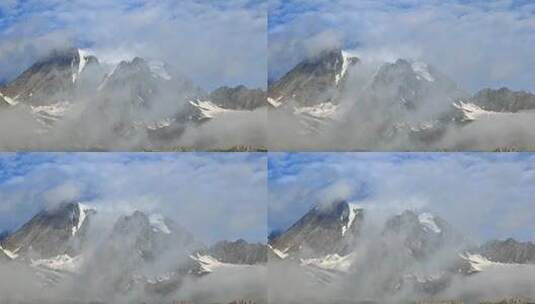 云雾缭绕的四川甘孜党龄山脉主峰夏羌拉雪山高清在线视频素材下载