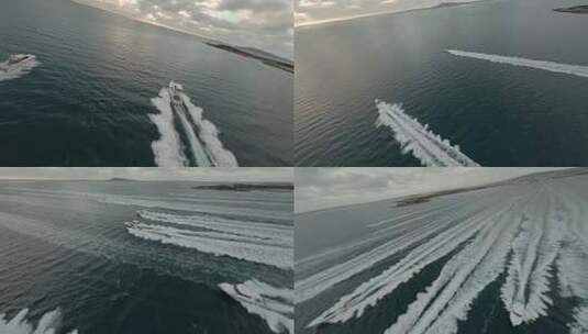 FPV无人机航拍几辆摩托艇海面航行划出海浪高清在线视频素材下载