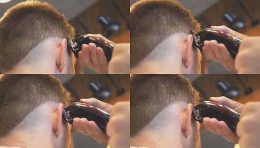 美发师的手臂在沙龙里用剪刀给顾客做男性理发高清在线视频素材下载