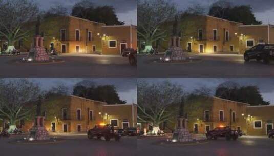 墨西哥伊萨马尔小镇广场汽车雕塑夜景地拍高清在线视频素材下载