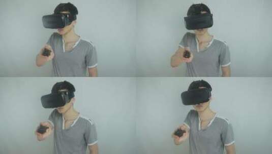 男人在玩虚拟现实的头盔高清在线视频素材下载
