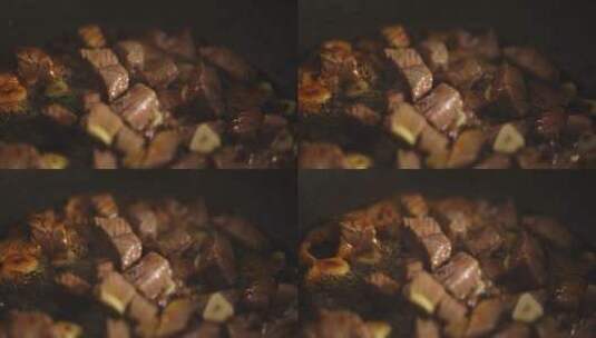 油锅中煎炸的牛排特写高清在线视频素材下载