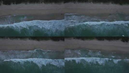 夕阳下的深圳西涌海岸线、沙滩海浪浪花航拍高清在线视频素材下载