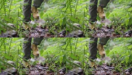 女子在阴雨天的森林中行走脚步特写高清在线视频素材下载