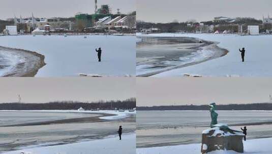 雪地中有人在手持设备进行拍摄高清在线视频素材下载