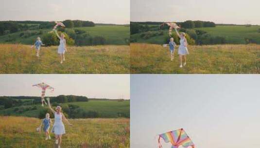 女孩和母亲带着风筝跑高清在线视频素材下载