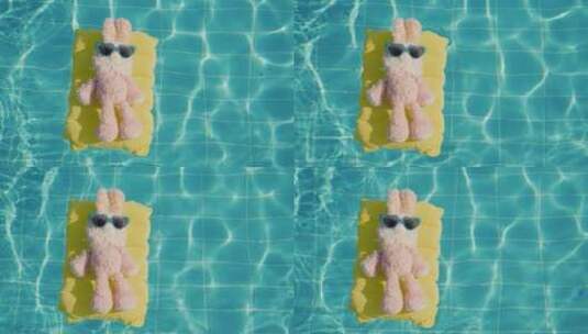 兔子玩偶漂浮在游泳池里高清在线视频素材下载