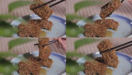 筷子夹起一块小米排骨粉蒸排骨高清在线视频素材下载