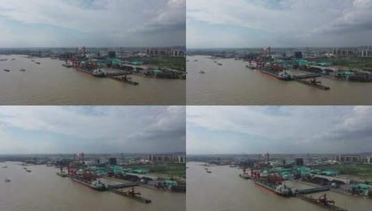 航拍长江口岸的货轮高清在线视频素材下载
