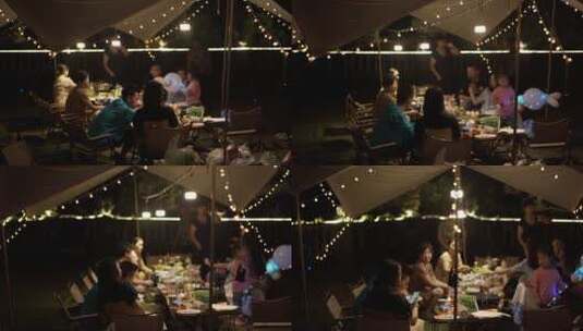 露营基地正在吃晚餐的一家人高清在线视频素材下载