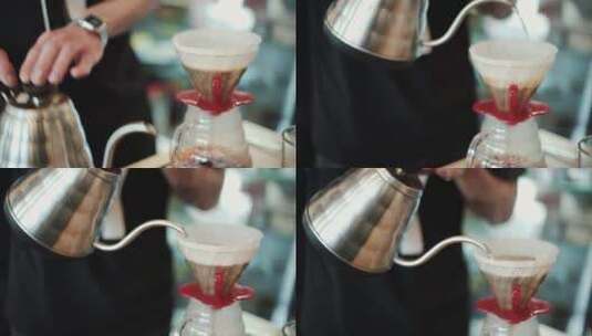 咖啡师将热水咖啡倒入过滤器高清在线视频素材下载