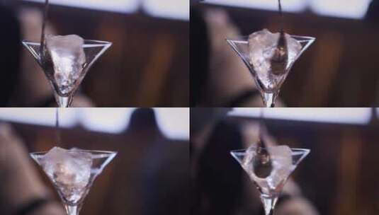 4K酒吧调酒师鸡尾酒杯子旋转冰块高清在线视频素材下载