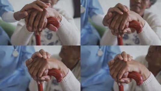 女医生和老年患者手拉手特写高清在线视频素材下载