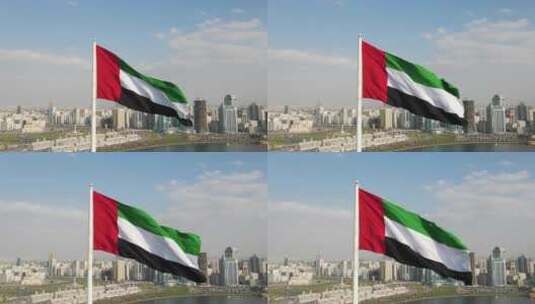 无人机视图：阿联酋北部沙迦国旗岛上空挥舞的阿拉伯联合酋长国国旗高清在线视频素材下载