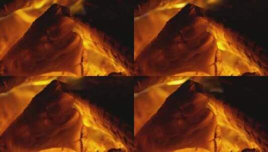 燃烧木炭火焰柴火堆篝火特写高清在线视频素材下载