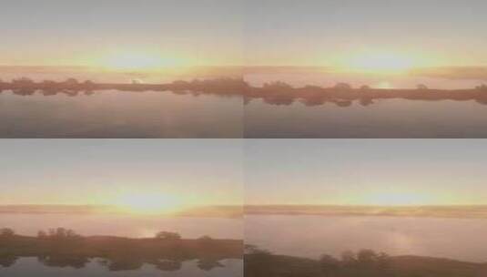 太阳下山的余光照射在湖面高清在线视频素材下载