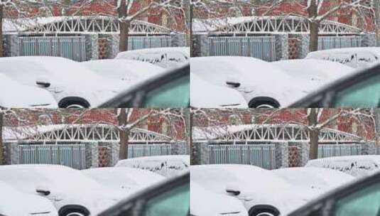 下雪中汽车上的积雪高清在线视频素材下载