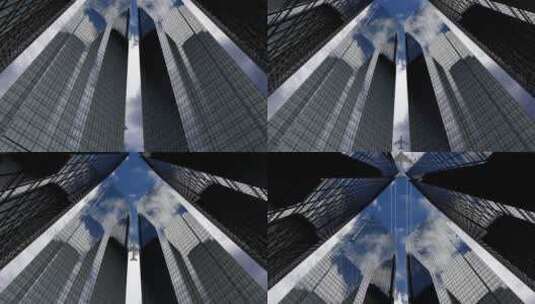 飞机飞过城市高楼大厦高清在线视频素材下载