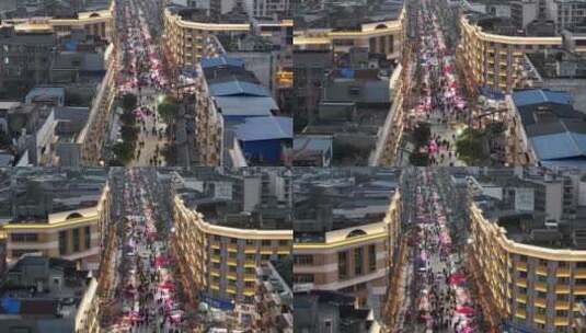 航拍广汉百伦百货广场商业中心夜市高清在线视频素材下载