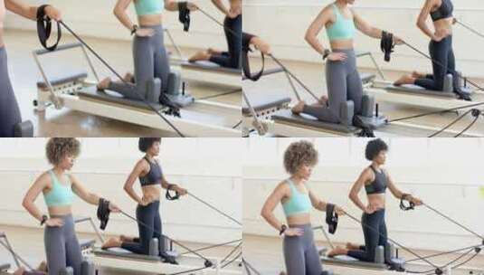两个女人用重组机进行普拉提锻炼高清在线视频素材下载