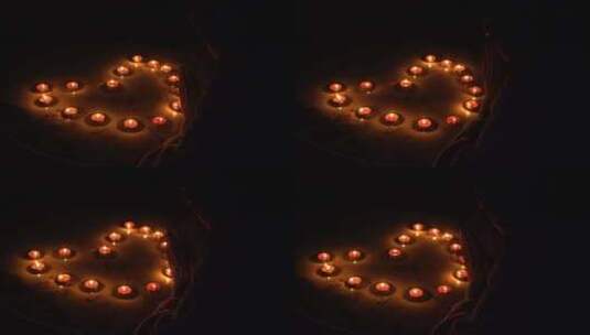 情人节氛围对着心形蜡烛高清在线视频素材下载