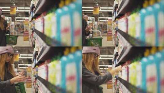 女子在超市挑选食物高清在线视频素材下载