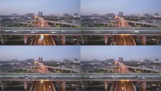 俯瞰傍晚城市交通高架桥立交桥车流航拍高清在线视频素材下载